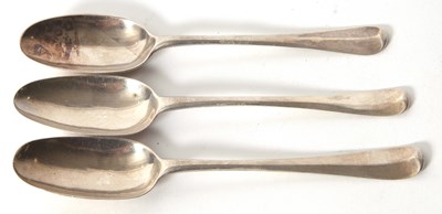 Lot 20 - Three Georgian Hanovarian rat tail spoons,...