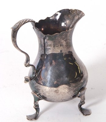 Lot 49 - A late Victorian silver cream jug of plain...