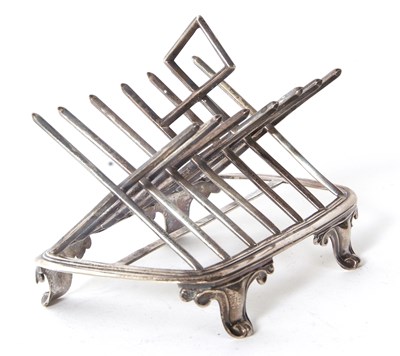 Lot 58 - A Victorian silver toast rack of angular...