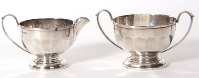 Lot 61 - A George V silver twin handle sugar bowl and...