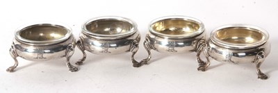 Lot 72 - Four George III silver cauldron salts, raised...