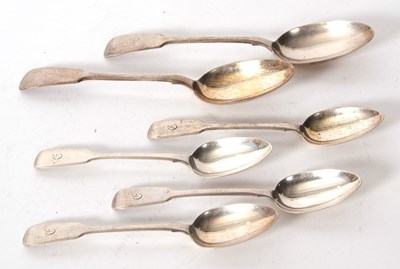 Lot 84 - Four George III fiddle pattern dessert spoons...