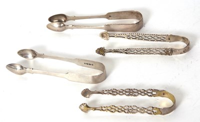 Lot 91 - Four pairs of sugar tongs to include two...