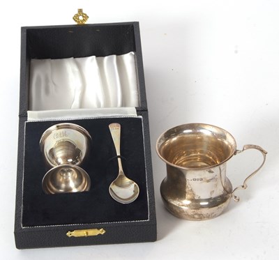 Lot 102 - A cased silver Christening egg cup and spoon,...