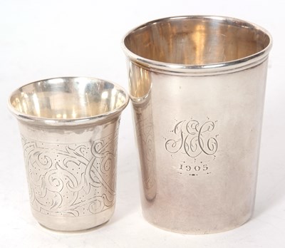 Lot 143 - A hallmarked silver beaker of plain tapering...