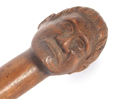 Lot 209 - A vintage carved hardwood walking stick,...