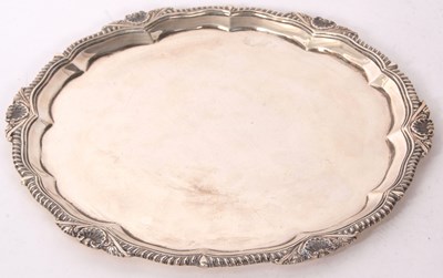 Lot 227 - A George V silver salver, of shaped circular...