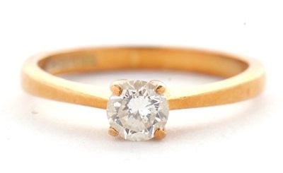 Lot 1 - An 18ct diamond solitaire ring, the round...