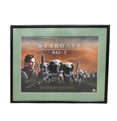 Lot 295 - A Stargate SG-1 poster, 'The Journey Continues....