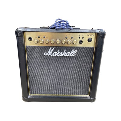 Lot 239 - A Marshall MG15FX practice guitar amplifier,...