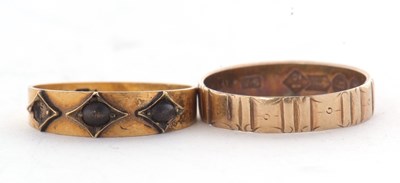 Lot 69 - Two gold rings, to include a late Victorian...