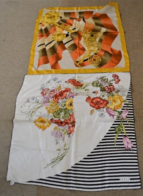 Lot 86 - Two ladies silk scarves, the first by Gucci...