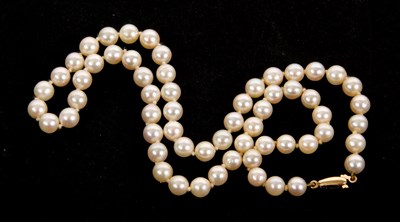 Lot 175 - A cultured pearl necklace, the round cultured...