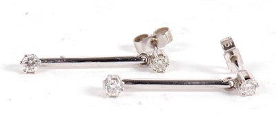 Lot 81 - A pair of 9ct white gold and diamond earrings,...