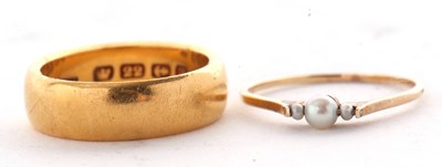 Lot 148 - A 22ct wedding band, Birmingham 1900, with...