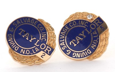 Lot 144 - A pair of 14k dress studs, with branded blue...