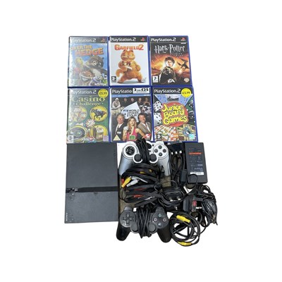 Lot 406 - A Playstation 2, with accessories and games to...