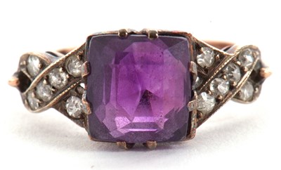 Lot 23 - An amethyst and diamond ring, the modified...