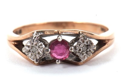 Lot 28 - A 9ct ruby and diamond ring, the central claw...