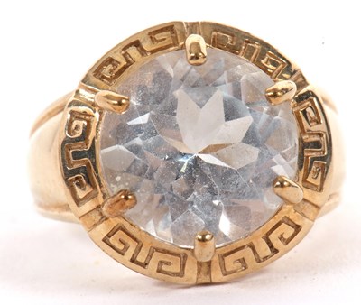 Lot 3 - A 9ct topaz dress ring, the round pale...