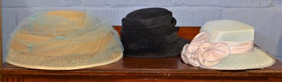 Lot 112 - Three lady's hats to include a straw hat with...