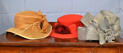 Lot 118 - Three lady's hats to include a beige straw hat...