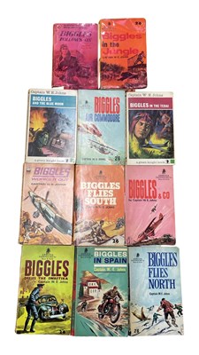 Lot 18 - A collection of Biggles paperback books, to...