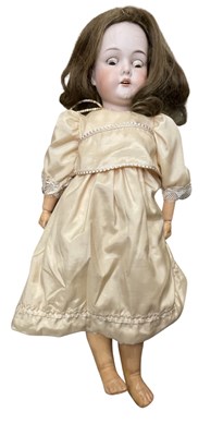 Lot 338 - A C M Bergmann biqsue head doll, with brown...