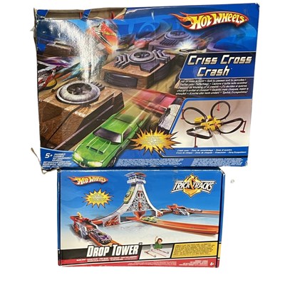 Lot 384 - A pair of boxed Hotwheels racing sets, to...