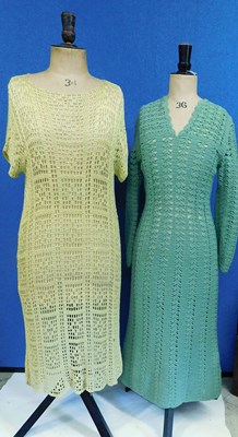 Lot 66 - Two mid circa 1970's crochet dresses, one in...