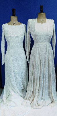 Lot 84 - Two mid 20th Century wedding dresses, one...